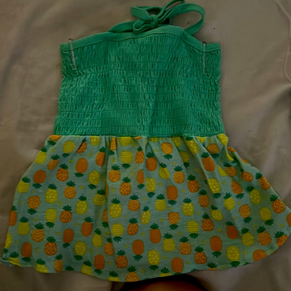 Medium light green stretch top summer dress with orange & yellow pineapples